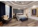 Spacious bedroom with a plush bed and sitting area at 2 Yorkridge Ct, Henderson, NV 89052