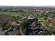 Aerial view of clubhouse with parking and surrounding golf course at 2 Yorkridge Ct, Henderson, NV 89052