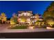 Elegant two-story home with landscaped yard and lighting at 2 Yorkridge Ct, Henderson, NV 89052