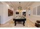 Game room with billiard table and unique light fixture at 2 Yorkridge Ct, Henderson, NV 89052