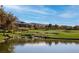 Scenic golf course view with pond and trees at 2 Yorkridge Ct, Henderson, NV 89052