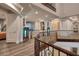 Open upper hallway with a view and wood flooring at 2 Yorkridge Ct, Henderson, NV 89052
