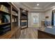 Bright home office with built-in shelving and fireplace at 2 Yorkridge Ct, Henderson, NV 89052