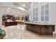 Gourmet kitchen with large island and bar at 2 Yorkridge Ct, Henderson, NV 89052