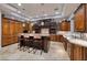 Bright kitchen offers ample cabinetry, large island, and top-of-the-line appliances at 2 Yorkridge Ct, Henderson, NV 89052