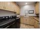 Bright laundry room with ample cabinet space and modern appliances at 2 Yorkridge Ct, Henderson, NV 89052