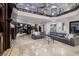 Open living space with sectional sofa and fireplace at 2 Yorkridge Ct, Henderson, NV 89052