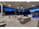 Covered patio with comfortable seating, fireplace and outdoor kitchen at 2 Yorkridge Ct, Henderson, NV 89052