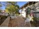 Charming brick patio with white metal furniture at 2 Yorkridge Ct, Henderson, NV 89052