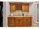 Wet bar with wine storage and granite countertop at 2 Yorkridge Ct, Henderson, NV 89052