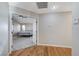 Hallway with wood floors leading to a spacious bedroom at 2124 Spanish Town Ave, North Las Vegas, NV 89031