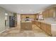 Bright kitchen with island and ample cabinetry at 2124 Spanish Town Ave, North Las Vegas, NV 89031