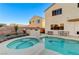 Escape to your own backyard oasis with a large pool and spa at 2124 Spanish Town Ave, North Las Vegas, NV 89031