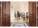 Impressive entry with double wood doors and a detailed floor at 2204 Glenbrook Way, Las Vegas, NV 89117