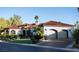 Two-car garage and attractive landscaping enhance this home's curb appeal at 2204 Glenbrook Way, Las Vegas, NV 89117