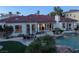 Luxury home with a large pool, patio, and beautifully landscaped grounds at 2204 Glenbrook Way, Las Vegas, NV 89117