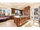 Bright kitchen with island, stainless steel appliances, and backyard access at 2204 Glenbrook Way, Las Vegas, NV 89117