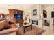 Luxurious living room with a large fireplace and comfortable seating at 2204 Glenbrook Way, Las Vegas, NV 89117