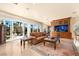 Comfortable living room with large TV, fireplace, and patio access at 2204 Glenbrook Way, Las Vegas, NV 89117