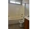 A full bathroom with a shower-tub combination, vanity, and toilet offers complete functionality at 3025 Sunrise Bay Ave, North Las Vegas, NV 89031