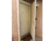 Front door with open screen door and exterior light fixture near the entrance to the home at 3025 Sunrise Bay Ave, North Las Vegas, NV 89031