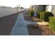 Concrete walkway leading through a landscaped area at 316 Linn Ln, Las Vegas, NV 89110