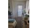 Bedroom with door leading to patio, dresser, and bed at 3550 Bay Sands Dr # 2048, Laughlin, NV 89029