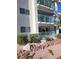 Exterior view of a two-story building with balconies and landscaping at 3550 Bay Sands Dr # 2048, Laughlin, NV 89029
