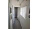 Bright hallway with bathroom access and wall art at 3550 Bay Sands Dr # 2048, Laughlin, NV 89029