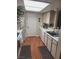 Kitchen with sink, dishwasher, and white cabinets at 3550 Bay Sands Dr # 2048, Laughlin, NV 89029