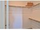 Walk-in closet with double rods and shelving at 4025 Redwood Glen Ct, Las Vegas, NV 89141