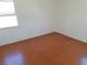 Bright bedroom featuring hardwood floors and a large window at 412 S Maryland Pkwy, Las Vegas, NV 89101
