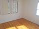 Bright bedroom with hardwood floors and window coverings at 412 S Maryland Pkwy, Las Vegas, NV 89101
