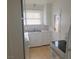 Simple kitchen with white cabinets and appliances at 412 S Maryland Pkwy, Las Vegas, NV 89101