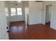 Living room with hardwood floors and access to other rooms at 412 S Maryland Pkwy, Las Vegas, NV 89101