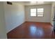 Living room with hardwood floors and large windows at 412 S Maryland Pkwy, Las Vegas, NV 89101