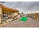 Backyard featuring a rock landscape, patio, and a fence at 4214 Bay Cir, Las Vegas, NV 89122
