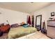 Bedroom featuring tile floors, a closet and a mini fridge at 4214 Bay Cir, Las Vegas, NV 89122