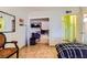 Bedroom with a view into an organized closet at 4214 Bay Cir, Las Vegas, NV 89122