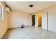 Bedroom with a lamp, tile flooring and access to a closet at 4214 Bay Cir, Las Vegas, NV 89122