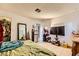 Bedroom view showcasing tile flooring, a TV and a mini fridge at 4214 Bay Cir, Las Vegas, NV 89122