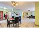 Open-concept dining room featuring tile floors and a view to the living space at 4214 Bay Cir, Las Vegas, NV 89122