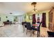 The dining room features tile flooring, stylish lighting, and access to the outdoor area at 4214 Bay Cir, Las Vegas, NV 89122
