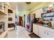Bright kitchen equipped with stainless steel refrigerator, sink and ample storage at 4214 Bay Cir, Las Vegas, NV 89122
