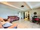 Relaxing living room with tile flooring, comfortable sofas and bright natural light at 4214 Bay Cir, Las Vegas, NV 89122