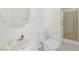 Bathroom with modern fixtures, white cabinets, and a glass door shower at 4929 Morning Falls Ave, Las Vegas, NV 89131