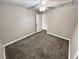 Spacious bedroom with ceiling fan and grey carpeting at 501 S Maryland Pkwy # B2, Las Vegas, NV 89101