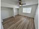 Bright bedroom with double closets and wood-look flooring at 501 S Maryland Pkwy # B2, Las Vegas, NV 89101