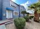 Inviting exterior of a duplex with landscaping and a palm tree at 501 S Maryland Pkwy # B2, Las Vegas, NV 89101