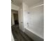Neat bathroom with shower/tub combo and grey flooring at 521 S Maryland Pkwy # A10, Las Vegas, NV 89101